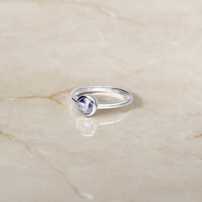 Pierścionek srebrny z tanzanitem w okrągłej oprawie