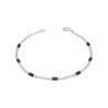 Bransoletka srebrna z drobnymi czarnymi koralikami na ozdobnym łańcuszku połączonym kuleczkami