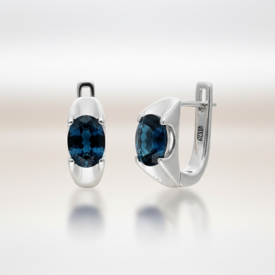 Kolczyki srebrne z topazem london blue na zapięciu angielskim